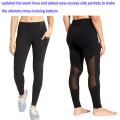 Pantalones de yoga con malla negra transparente y bolsillos laterales